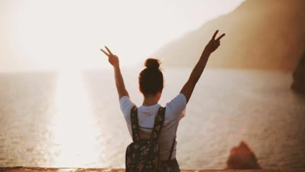 Person lifting their arms